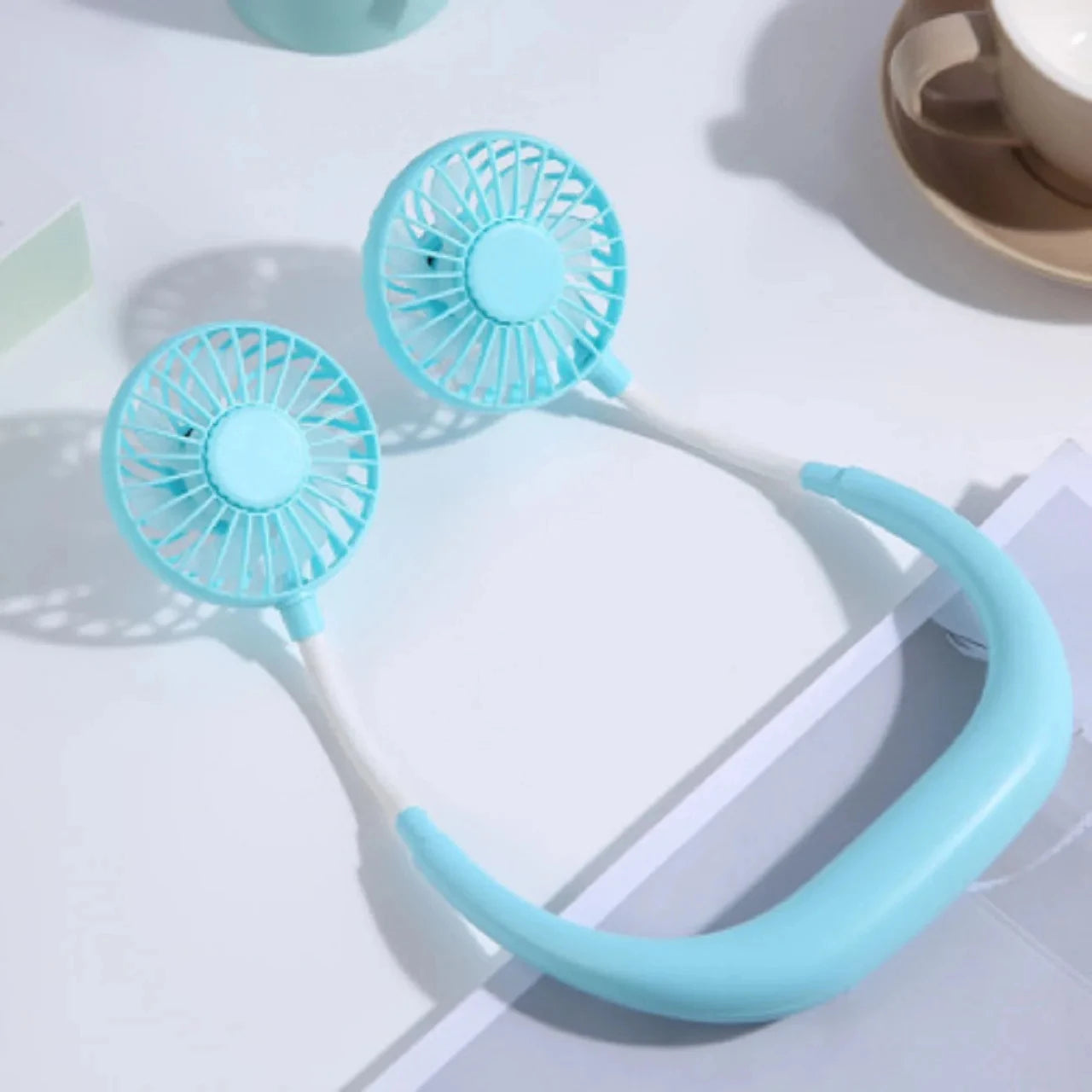 Moktan Sabai Compact Mini Fan | Portable Battery Operated Hand Held Fan with 3 Speed Settings | Lightweight Cooling Solution for Travel SKY BLUE