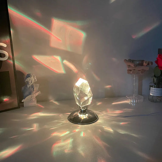 Crystal-like lamp on a surface with colorful light projection