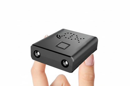 Small black device held between fingers with 1080p HD and motion detection features displayed.